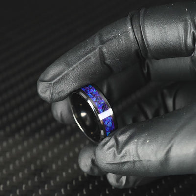 Matching Lavender Opal Glowstone Wedding Ring Set on Black Ceramic
