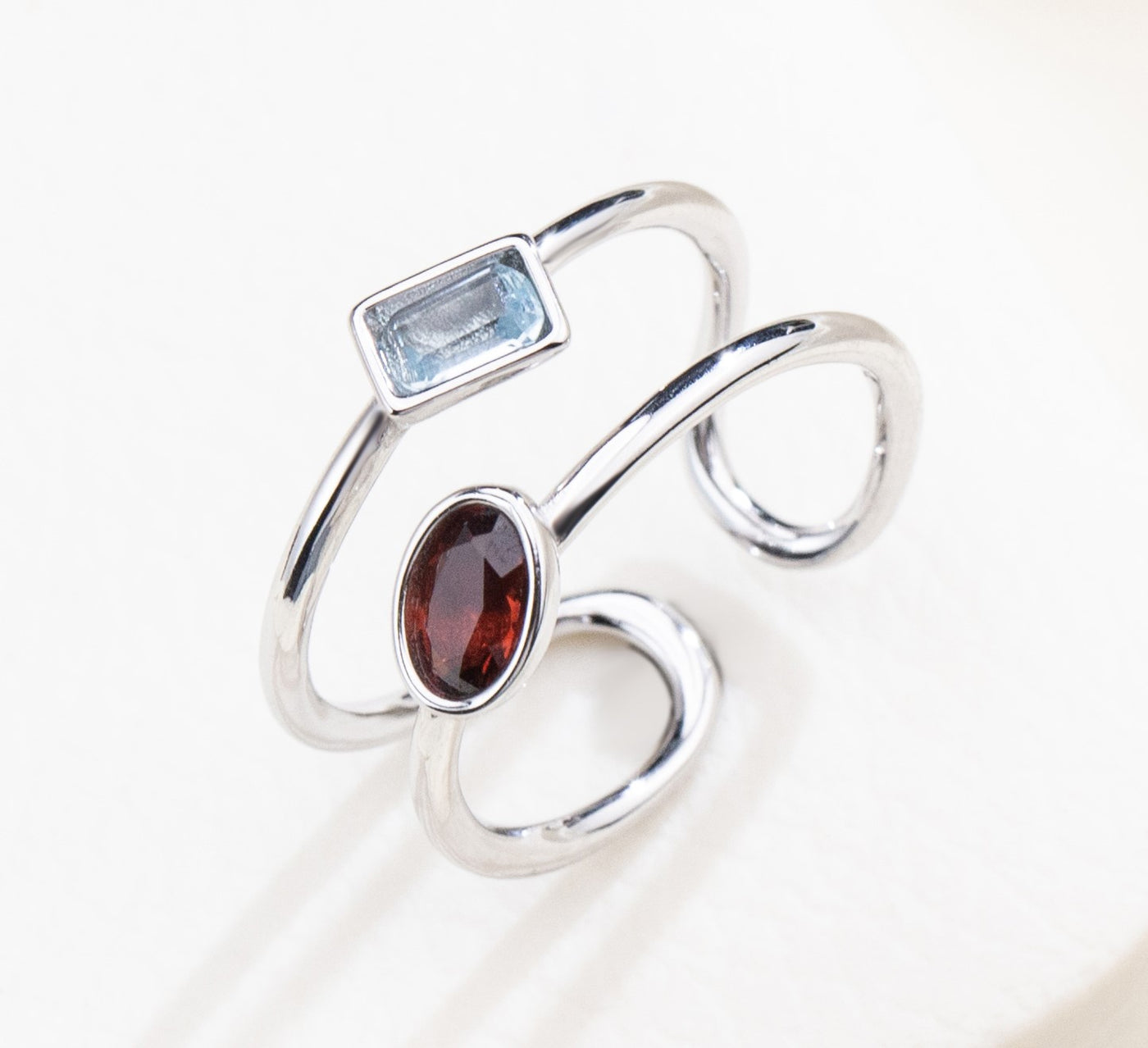 The Harmony Ring | Sterling Silver, Garnet, and Blue Topaz Dual Stone Ring - Patrick Adair Designs