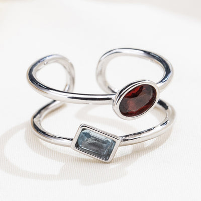 The Harmony Ring | Sterling Silver, Garnet, and Blue Topaz Dual Stone Ring - Patrick Adair Designs