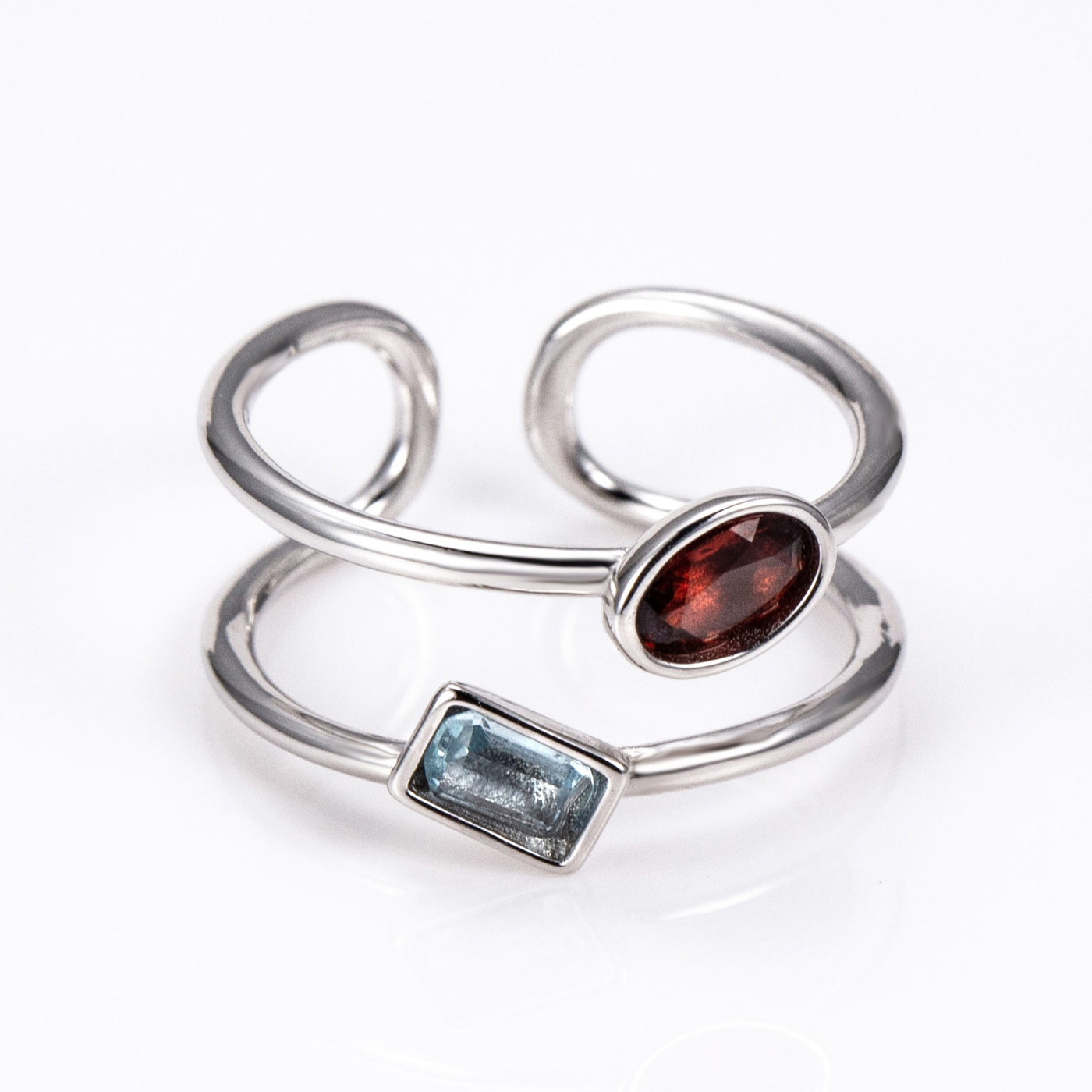 The Harmony Ring | Sterling Silver, Garnet, and Blue Topaz Dual Stone Ring - Patrick Adair Designs