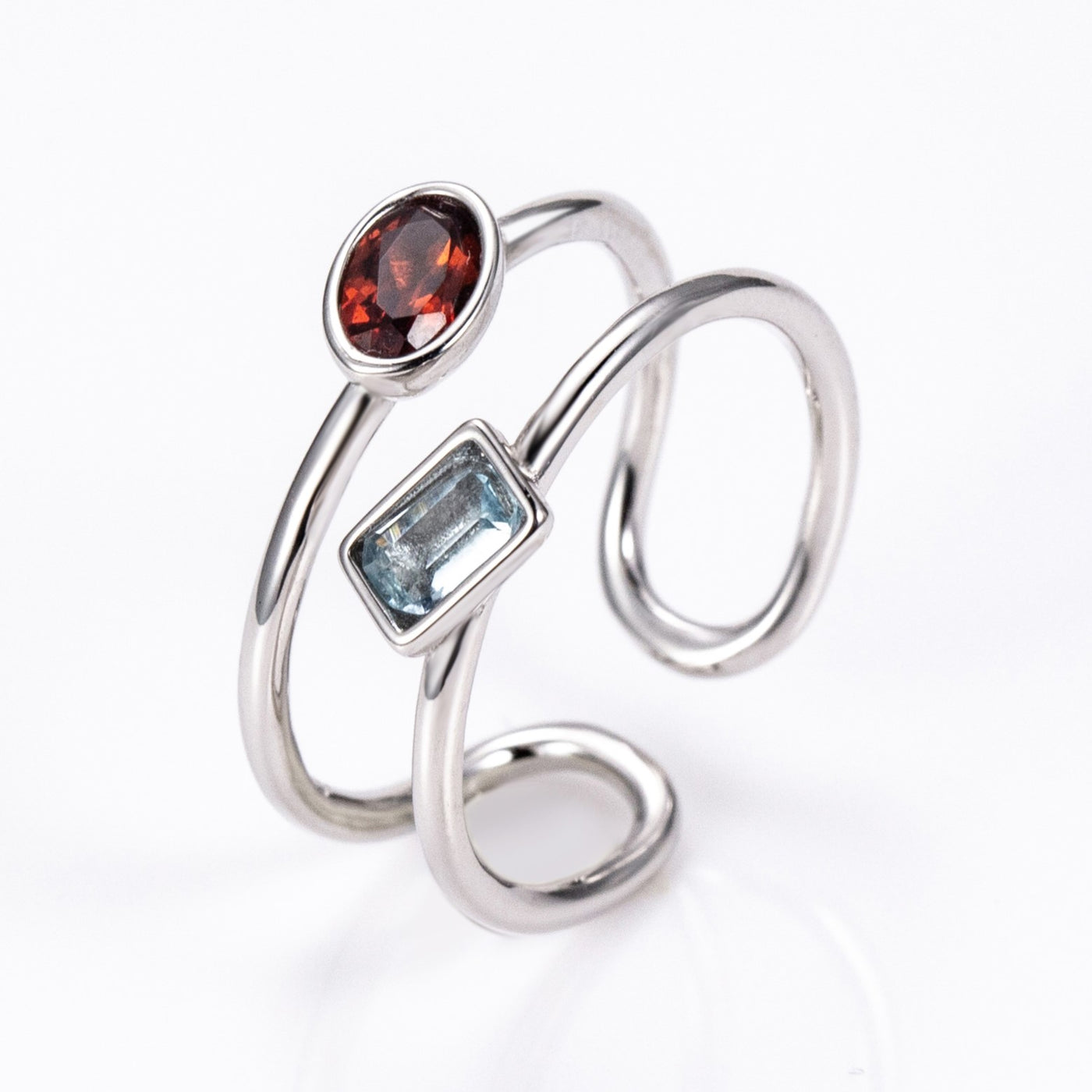 The Harmony Ring | Sterling Silver, Garnet, and Blue Topaz Dual Stone Ring - Patrick Adair Designs