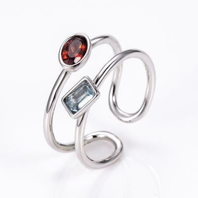 The Harmony Ring | Sterling Silver, Garnet, and Blue Topaz Dual Stone Ring - Patrick Adair Designs