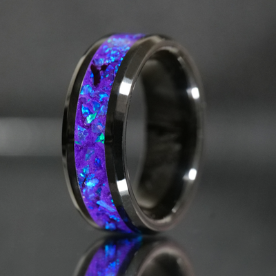 Matching Lavender Opal Glowstone Wedding Ring Set on Black Ceramic - Patrick Adair Designs