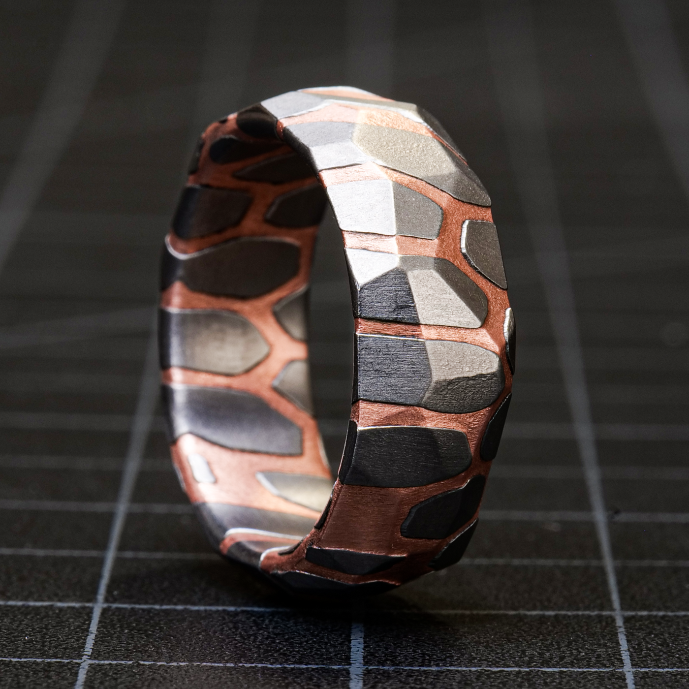 Acid etched superconductor ring online with obsidian facets