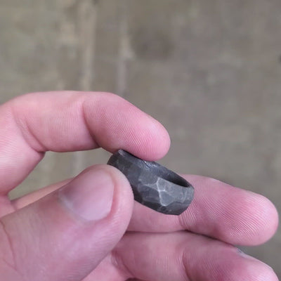 Meteorite hammered men's wedding ring.