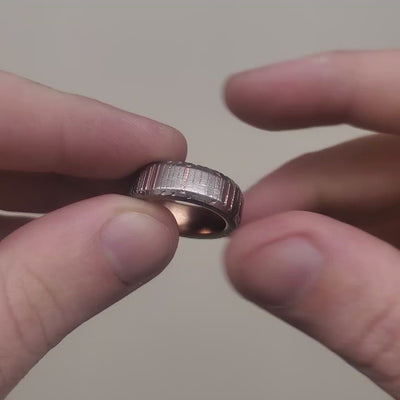 Superconductor and rose gold men's wedding ring.