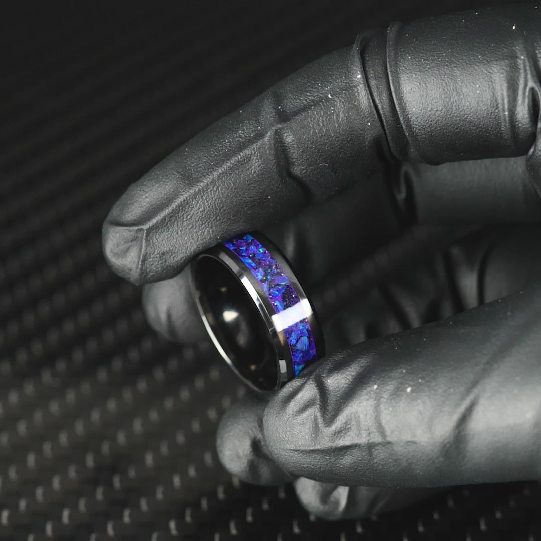 Matching Lavender Opal Glowstone Wedding Ring Set on Black Ceramic