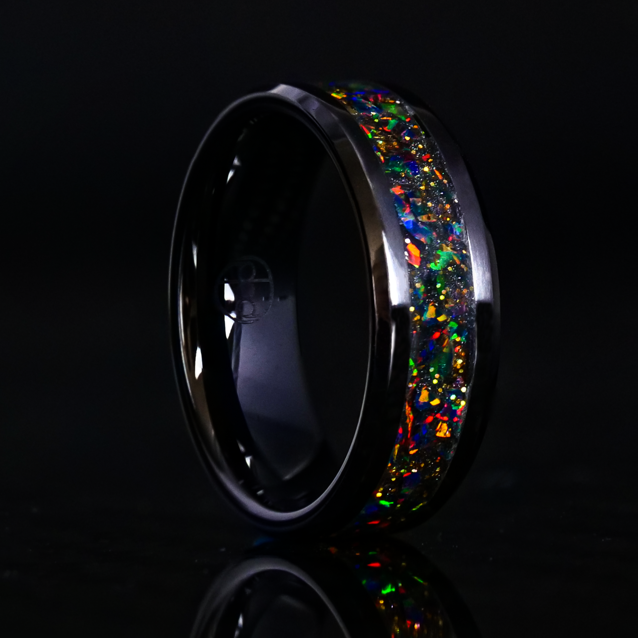 Radiant Black Fire Opal Glowstone Ring on Black Ceramic– Patrick Adair ...