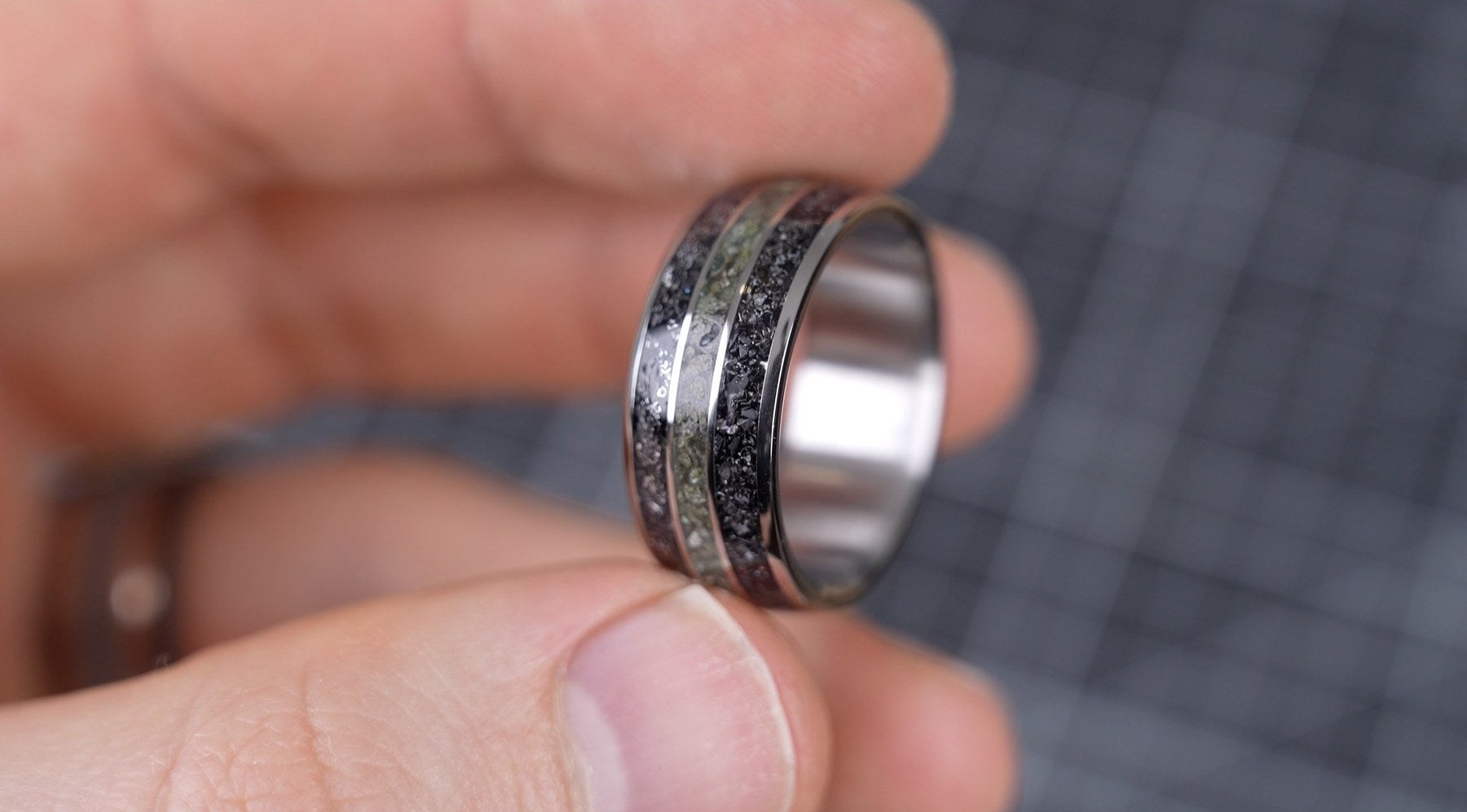 Close detail of the Terra Fortuna ring inlays