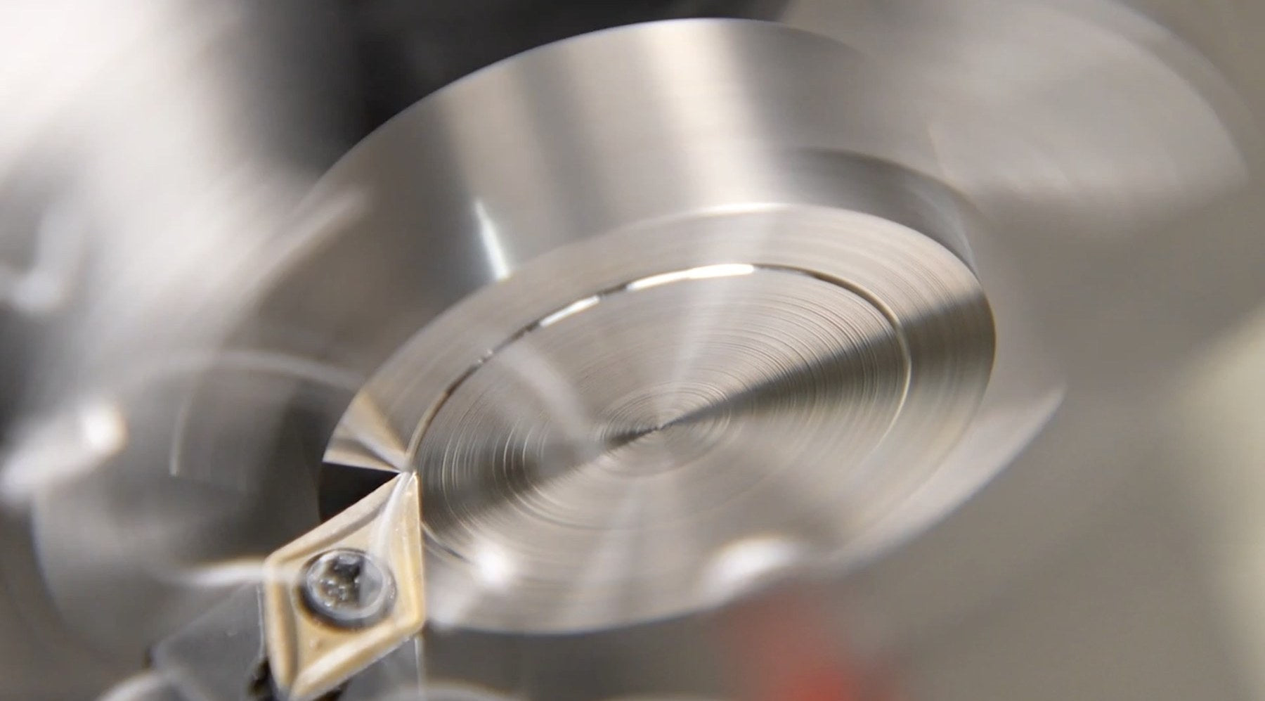 Ring channels being shaped on a lathe